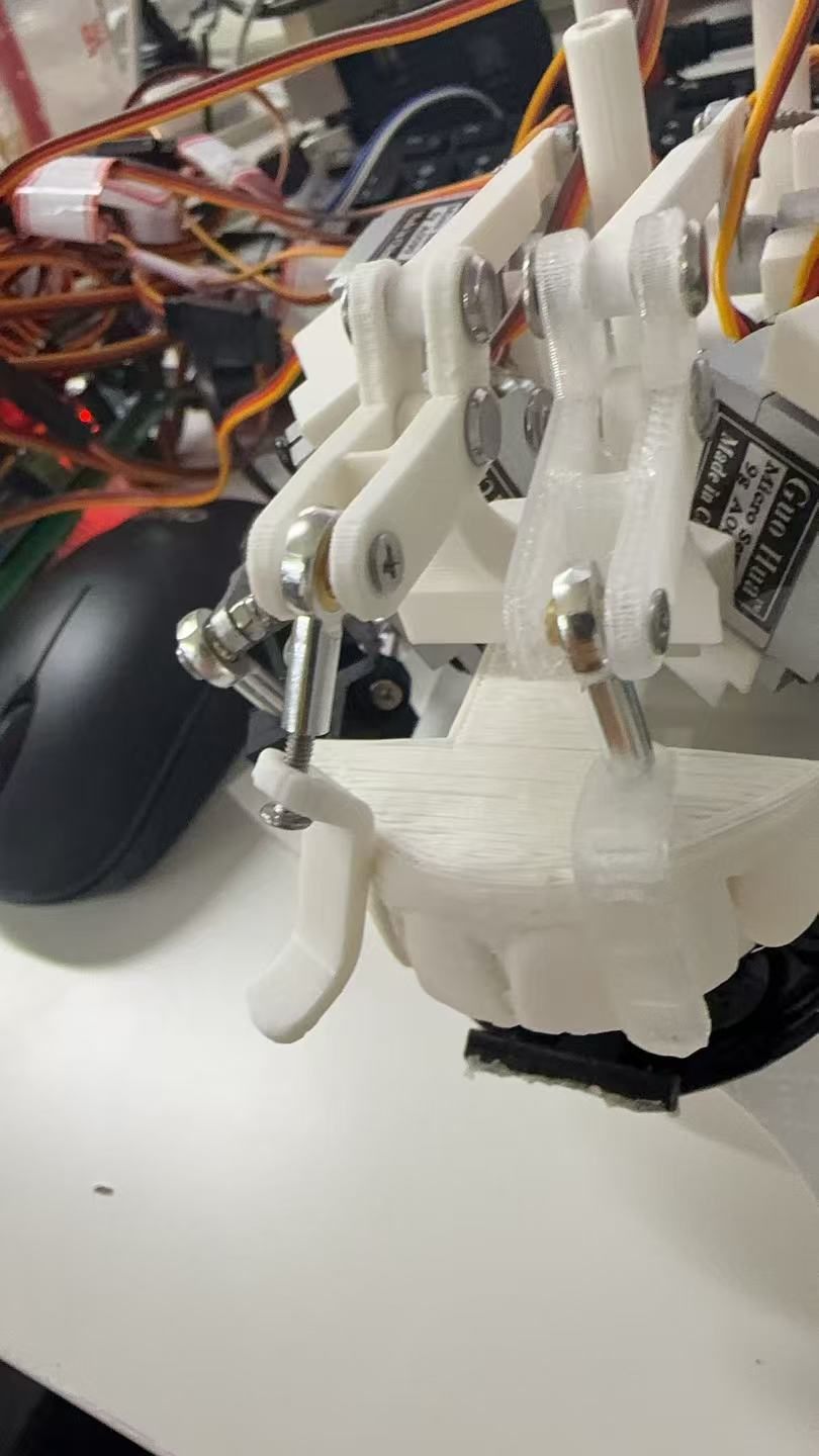 Open 3D-printed jaw and tooth mechanism driven by a micro servo